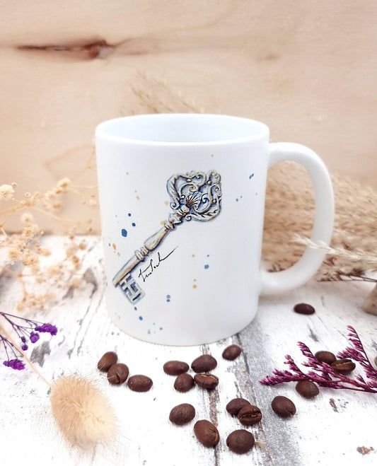 Tasse mit dem Schlüssel zum Glück